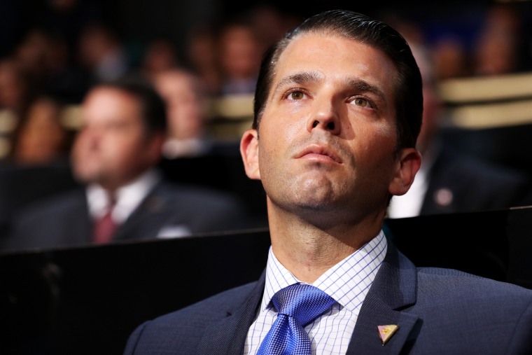 Image: Donald Trump Jr. listens to a speech on the first day of the Republican National Convention