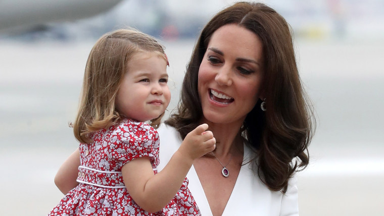 Kate, Duchess Of Cambridge, and Princess Charlotte, during trip to Poland