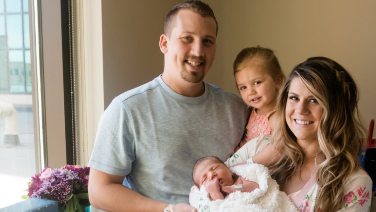 Connor, Jordyn, and three-year-old Paisley Eppard with baby Beauden