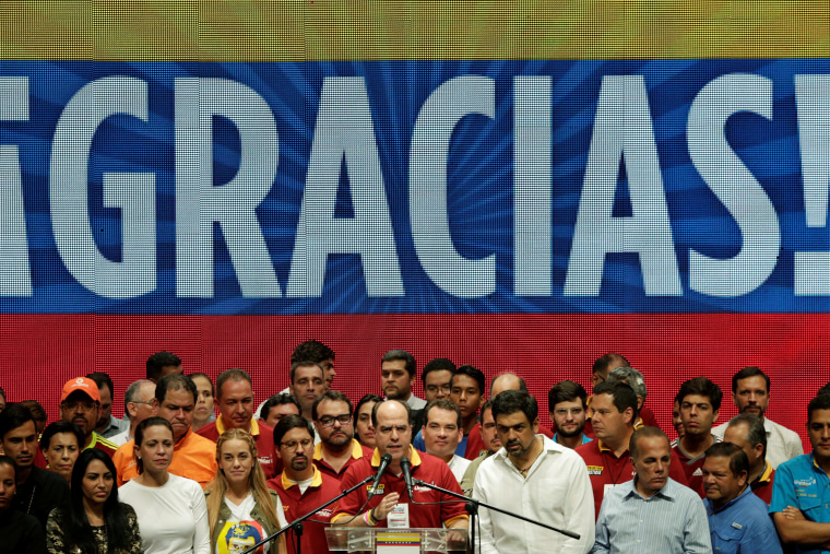 Image: Borges addresses the media after an unofficial plebiscite against President Nicolas Maduro's government and his plan to rewrite the constitution, in Cara