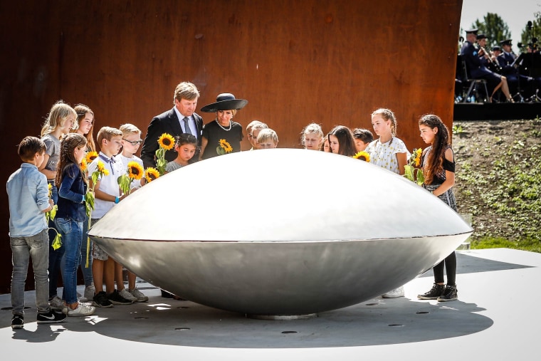 Image: King Willem-Alexander and his wife Queen Maxima of the Netherlands attend an event to unveil a national monument to commemorate the victims of the Malaysia Airlines crash in Ukraine in 2014 in Vijfhuizen