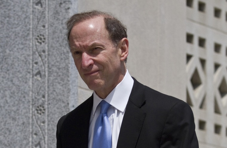 Image: Defense attorney Abbe Lowell steps outside while a jury began deliberations in the federal political corruption trial of former U.S. Senator John Edwards in North Carolina