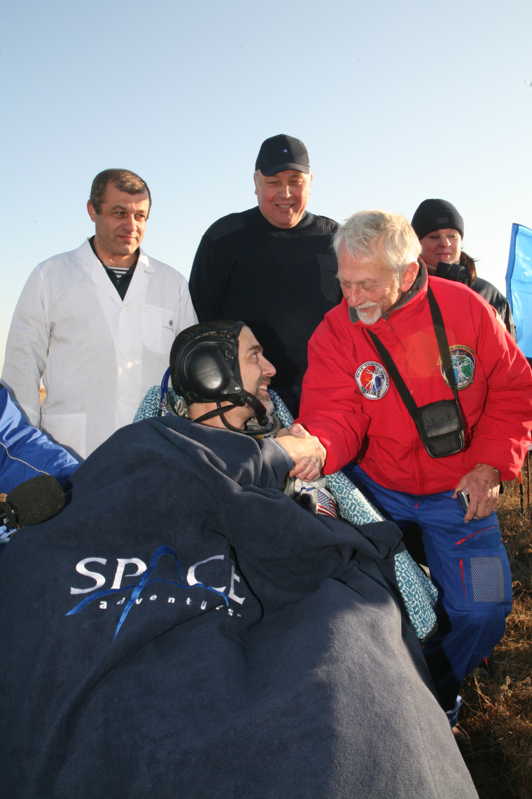 Richard Garriott and his father, former astronaut Owen Garriott, meet up after Richard's return to Earth