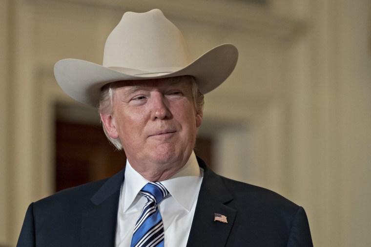Image: President Donald Trump wears a Stetson cowboy hat during a Made in America event