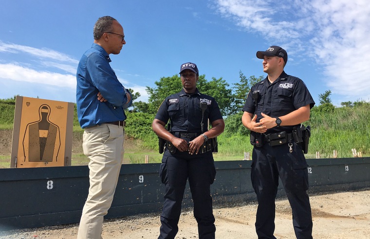 Image: Lester Holt talks to Kayan Dawkins and Gregory Wallce