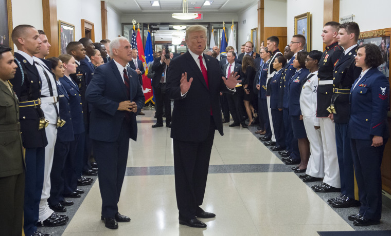 Image: President Donald Trump greets members of the U.S. military alongside Vice President Mike Pence at the Pentagon