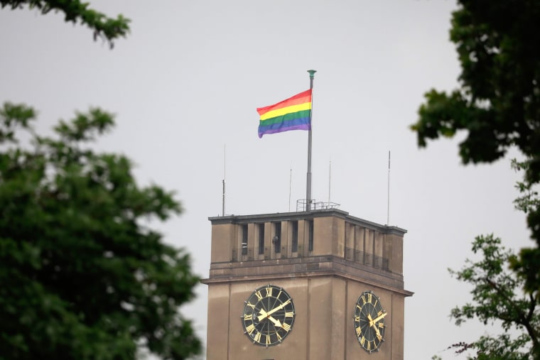 Image: A rainbow flag flutters on the city hall of Berlin's Schoeneberg district on June 30, 2017.