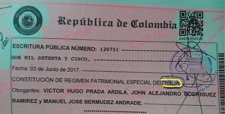 A photo of the "special patrimonial union" document that recognizes the legal partnership of Alejandro Rodriguez, Victor Hugo Prada and Manuel Bermudez