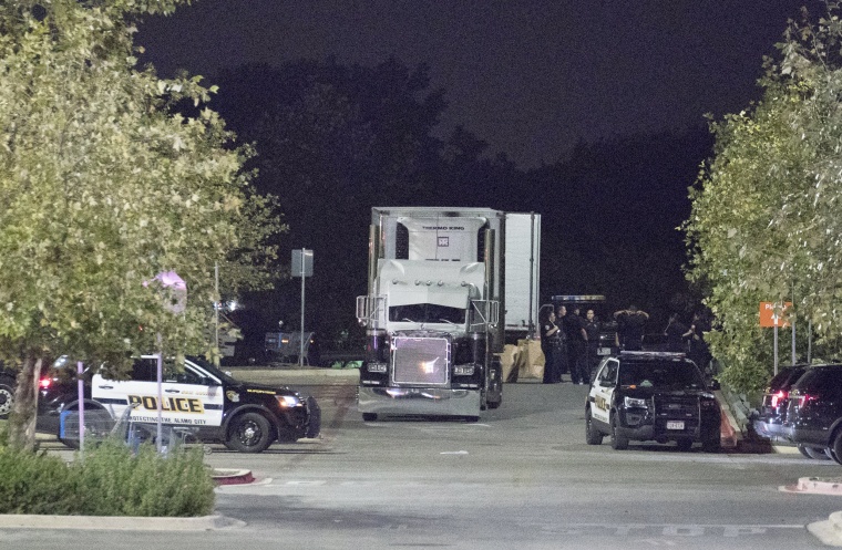Image: Officials investigate a truck that was found to contain 38 suspected illegal immigrants in San Antonio, Texas, July 23, 2017.