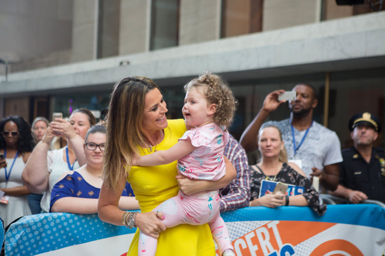 Mommy and daughter time on the plaza.