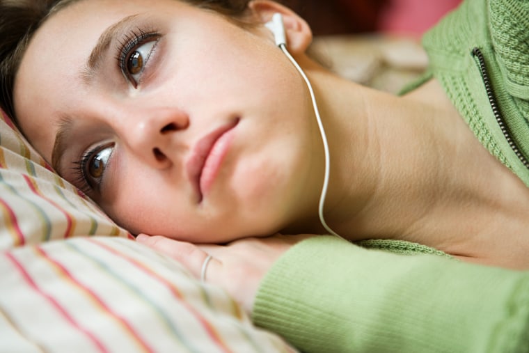 Image: A Teenage Girl Listening to Music