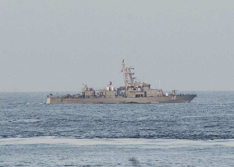 Image: US patrol boat fires warning shots near Iranian naval ship