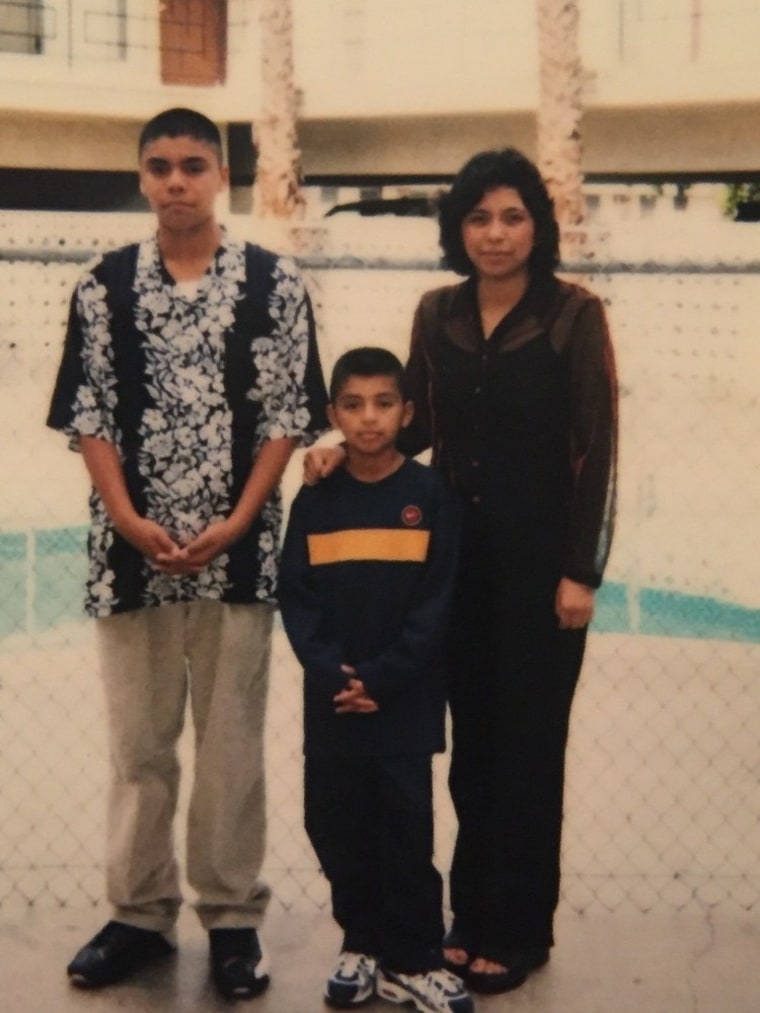 Rogelio Garcia as a teen with his mom and brother.