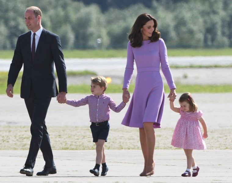 Image: Prince William and his wife Kate, the Duchess of Cambridge, and their children