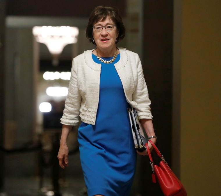 Image: Senator Susan Collins, R-Maine, walks to the Senate floor ahead of a vote on the health care bill on Capitol Hill in Washington