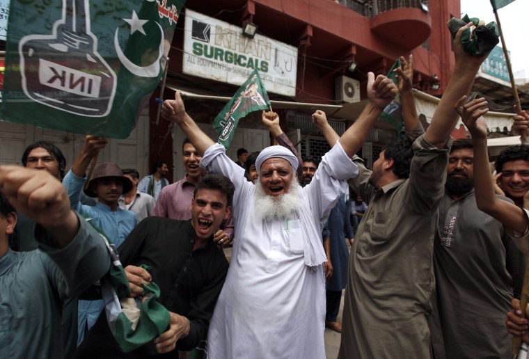 Image: Opponents of Nawaz Sharif cheer Friday's ruling that he must leave office.