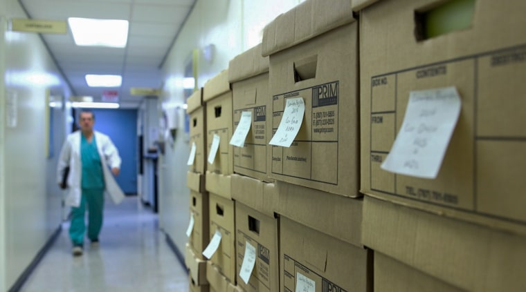 Dr. Pablo Rodriguez, director of the trauma center at the Puerto Rico Medical Center, makes way to his office with a long day of work ahead. 