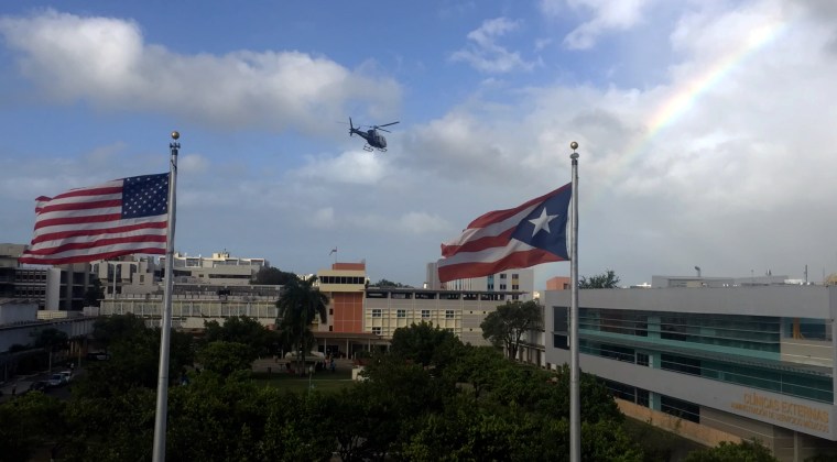 A helicopter lands on the roof of Puerto Rico Medical Center in San Juan.