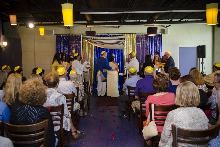 Couple throws "Beauty and the Beast" themed wedding to delight grandchildren