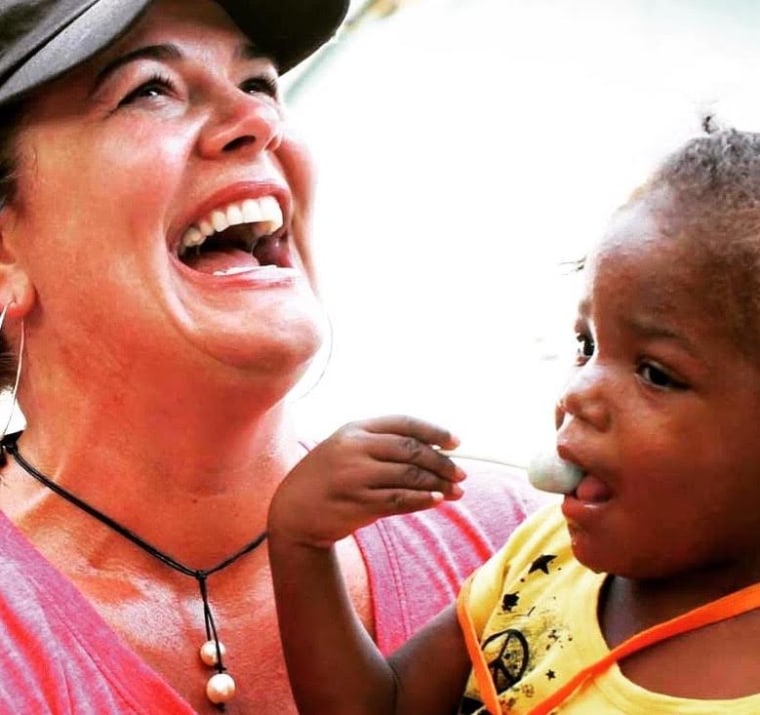 Harper and Missy's first meeting, in Haiti in 2012, when Missy was 2 years old.