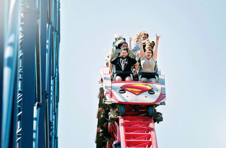 Couple gets married on Superman roller coaster at Six Flags