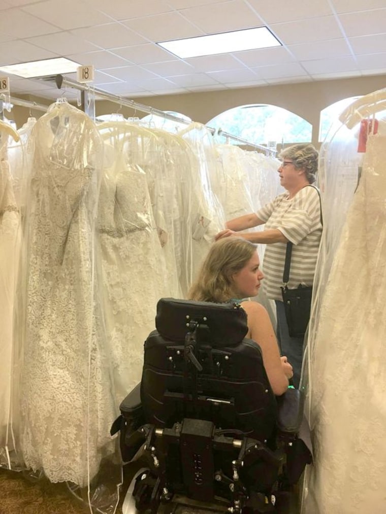 Julie McMillian shops for wedding dress in a wheelchair