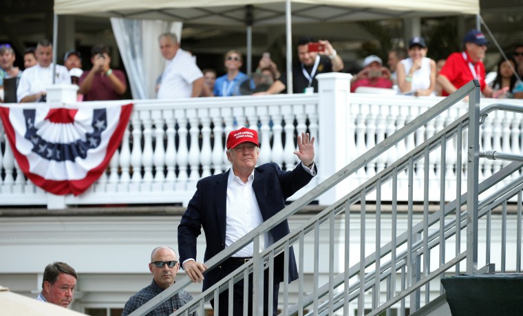 Image: Trump attends the U.S. Women's Open at his golf course in Bedminster, New Jersey