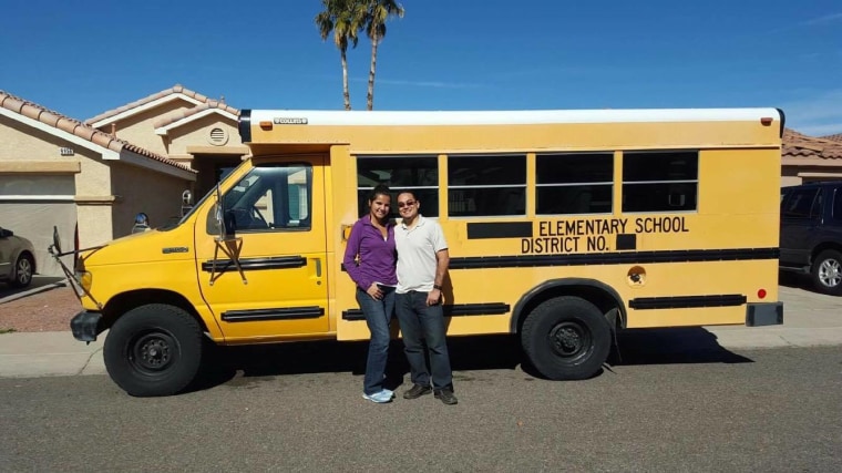 The late Celso Salinas-Mireles and his wife, Ileana in front of the bus they planned to use as they toured cross-country, sharing their music, especially to migrant communities.