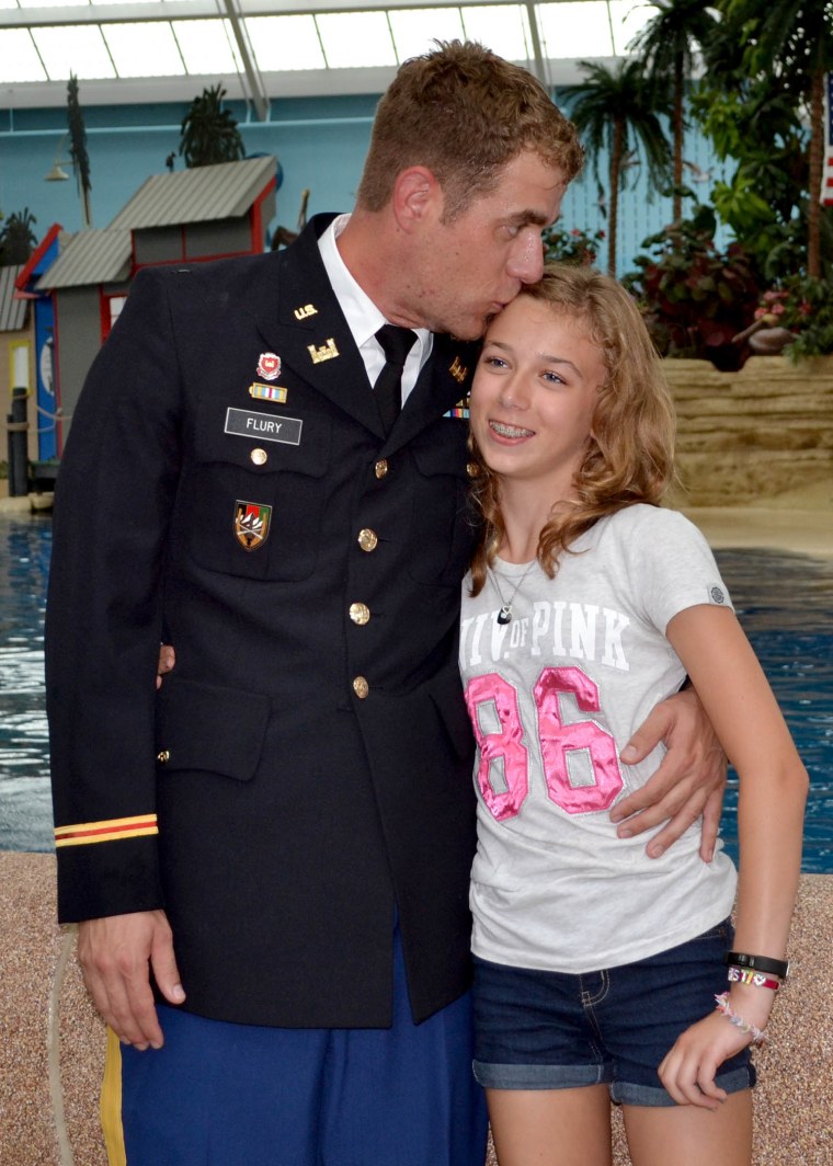 Army dad and daughter reunited in surprise at the zoo