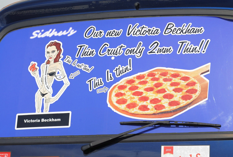 VICTORIA BECKHAM TO SUE TYNESIDE TAKEAWAY - AFTER SEEING SHOCKING 'ANOREXIC' CARICATURE .. 
A Sidhu Golden Fish and Chips van - emblazoned with an advert featuring a shocking caricature of Victoria Beckham as an 'anorexic fashion icon'.  
NOW - a spokesperson for Victoria Beckham has slammed the advert, and stated they will be launching legal action against the Tyneside firm.
