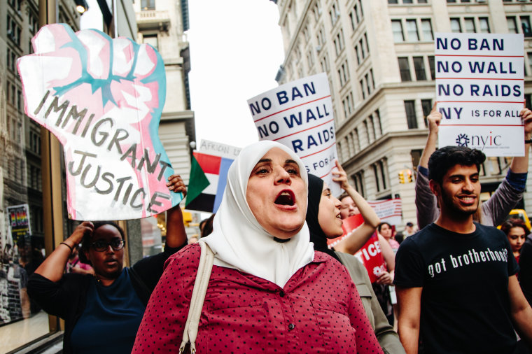 Image: People participate in a rally to protest the separation of families under US President Donald J. Trump's travel ban in New York