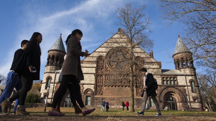 Image: People walk around the Princeton University campus in New Jersey