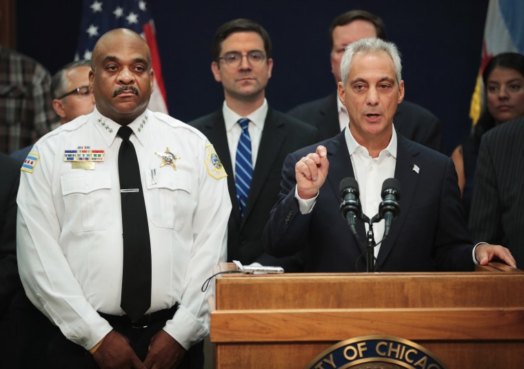 Image: Chicago Mayor Rahm Emanuel, right, stands with Chicago Corporation Counsel Ed Siske, center, and Chicago Police Department (CPD) Superintendent Eddie Johnson as he announces that the City of Chicago will file a federal lawsuit