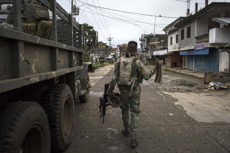 Image: Government soldiers prepare for deployment to the main battle area in Marawi.