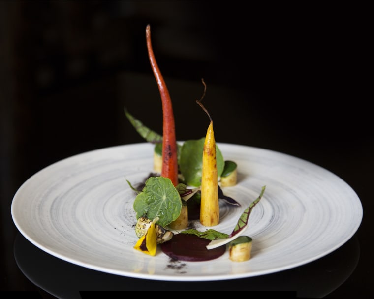 A dish featuring zucchini, carrot, beet, and chive puree from chef Niki Nakayama's n/naka restaurant in Los Angeles.