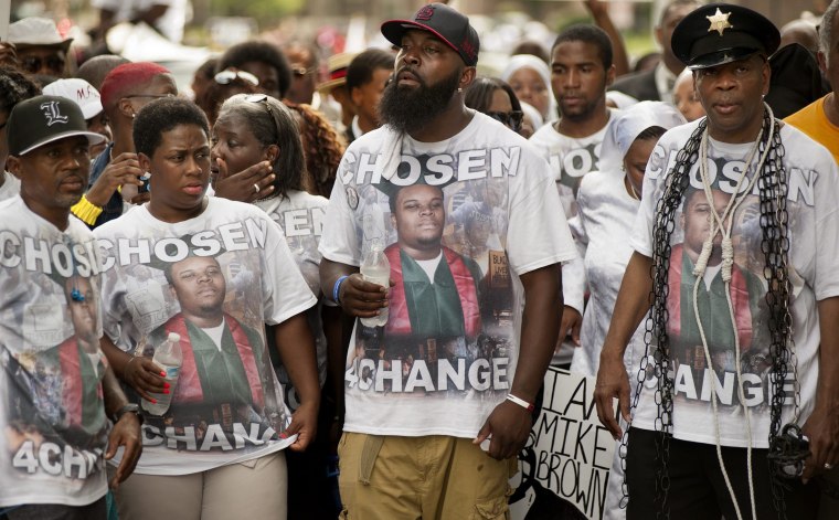 Image: Moment of silence, rally held on one-year anniversary of shooting death of Michael Brown Jr.