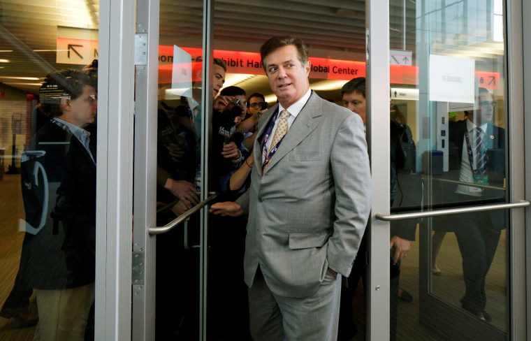 Image: Paul Manafort, campaign manager to Republican Presidential Candidate Trump, leaves as reporters ask about the Republican National Convention Committee on Rules in Cleveland