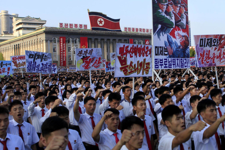 Image: Thousands of North Koreans gather for a rally at Pyongyang's Kim Il Sung Square