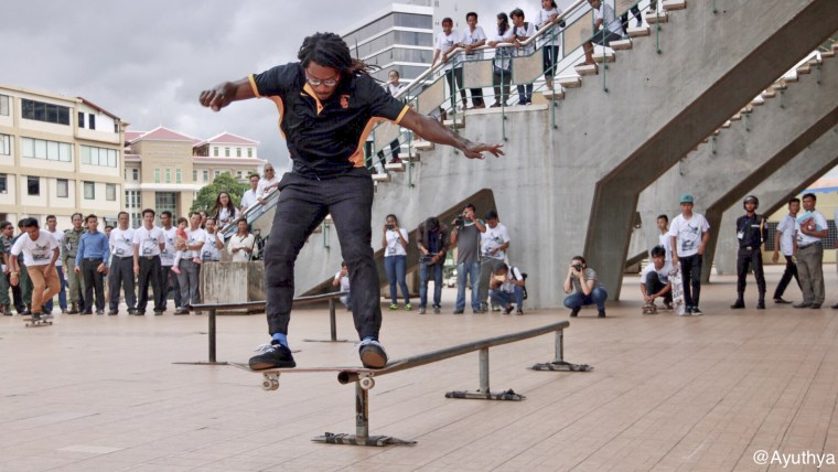 Neftalie Williams doing a nollie lipside during a State Department program in Cambodia.