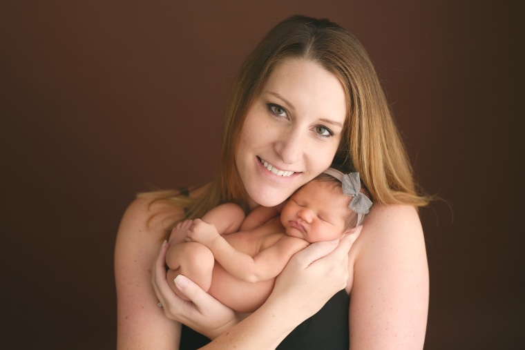 Michelle Zavala poses with her newborn baby. Michelle died from a blood clot eight days after giving birth.
