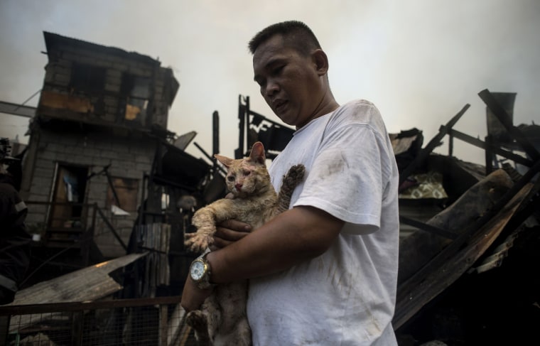 Image: TOPSHOT-PHILIPPINES-ACCIDENT-FIRE