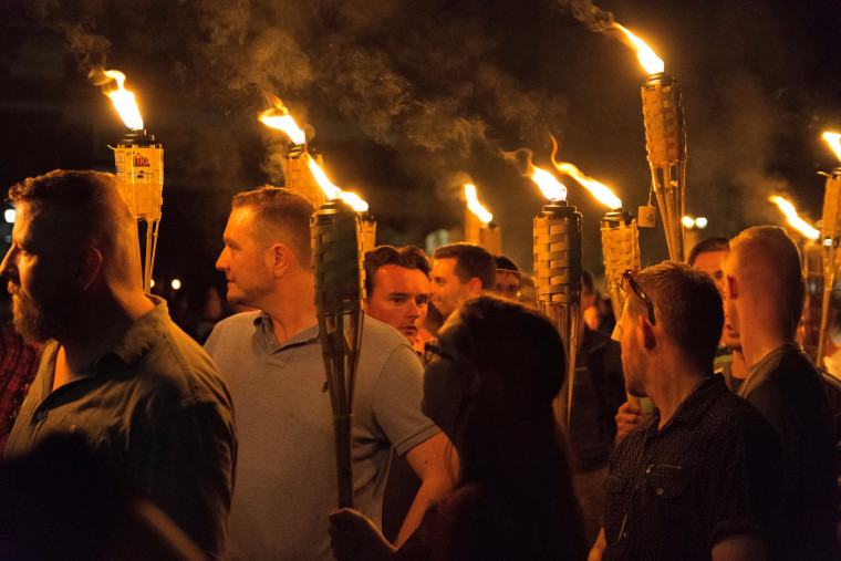 Image: White nationalists carry torches on the grounds of the University of Virginia