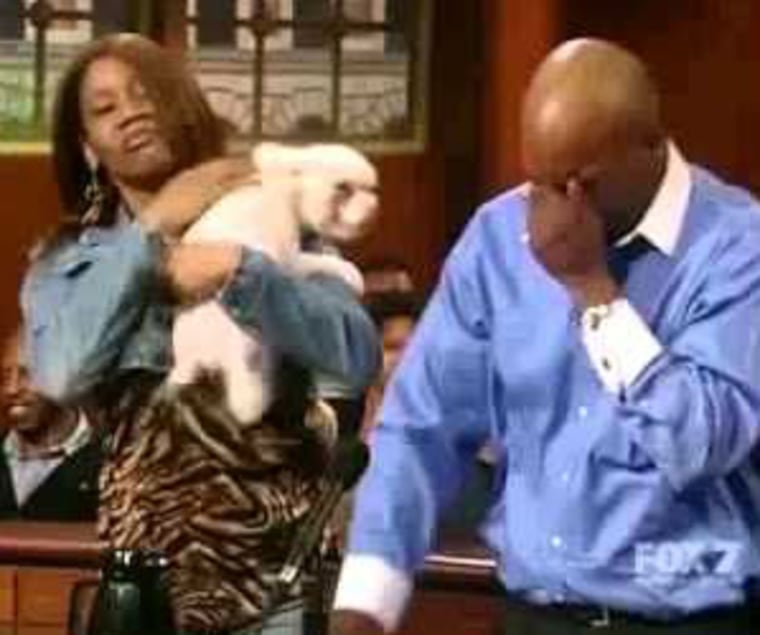 Judge Judy lets dog decide who his real owner is