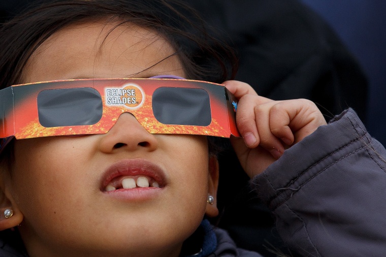 Looking directly at the sun during the eclipse can cause damage to the eye. Experts advise teaching kids caution. 