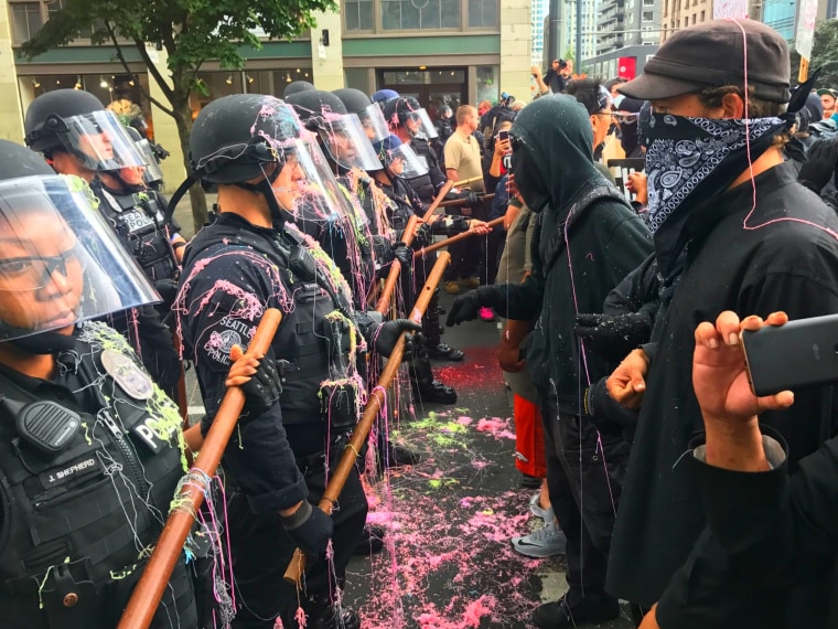 IMAGE: Protesters and police in Seattle