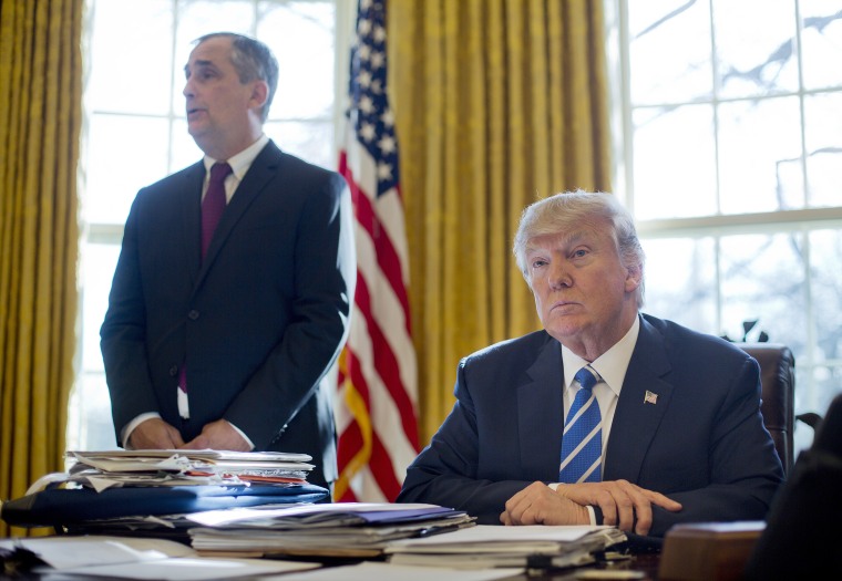 Image: President Donald Trump listens as Intel CEO Brian Krzanich speaks in the Oval Office of the White House
