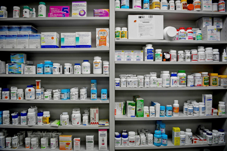 Image: FILE PHOTO - Bottles of medications line the shelves at a pharmacy in Portsmouth