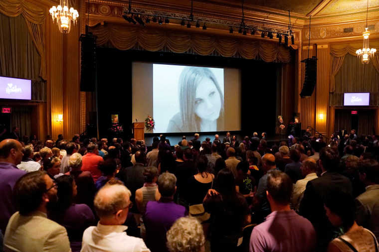 Mourners gather for a memorial service for car attack victim Heyer in Charlottesville, Virginia