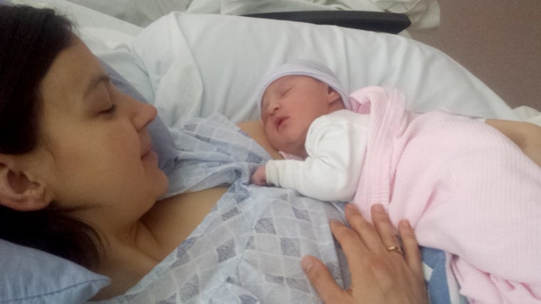 Image: Clare Shirley and her daughter Kit just after Kit was born last year after a fraught run to a nearby rural hospital that had closed its maternity ward a year before.