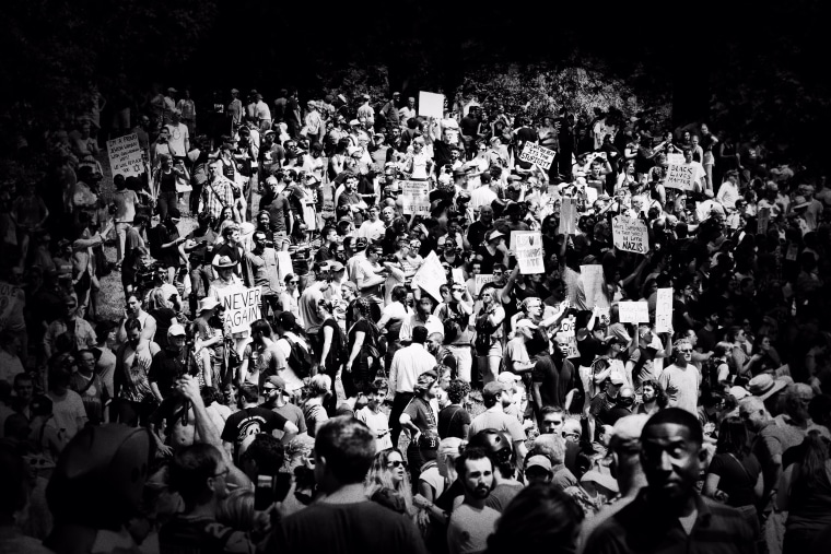 Image: The massive crowd that descended on the Common dwarfed the turnout for the 'Free Speech Rally' schedule for the afternoon.